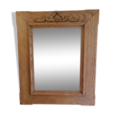 Antique mirror with knot in light oak