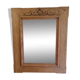Antique mirror with knot in light oak