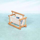 Bohemian magazine rack in vintage 70s pine style.