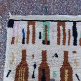 Moroccan handwoven wool rug, 250x150 cm, traditional style.