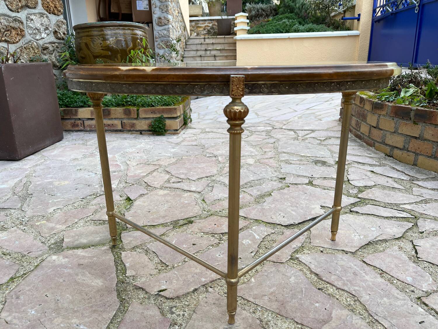 Bronze coffee table with marble top