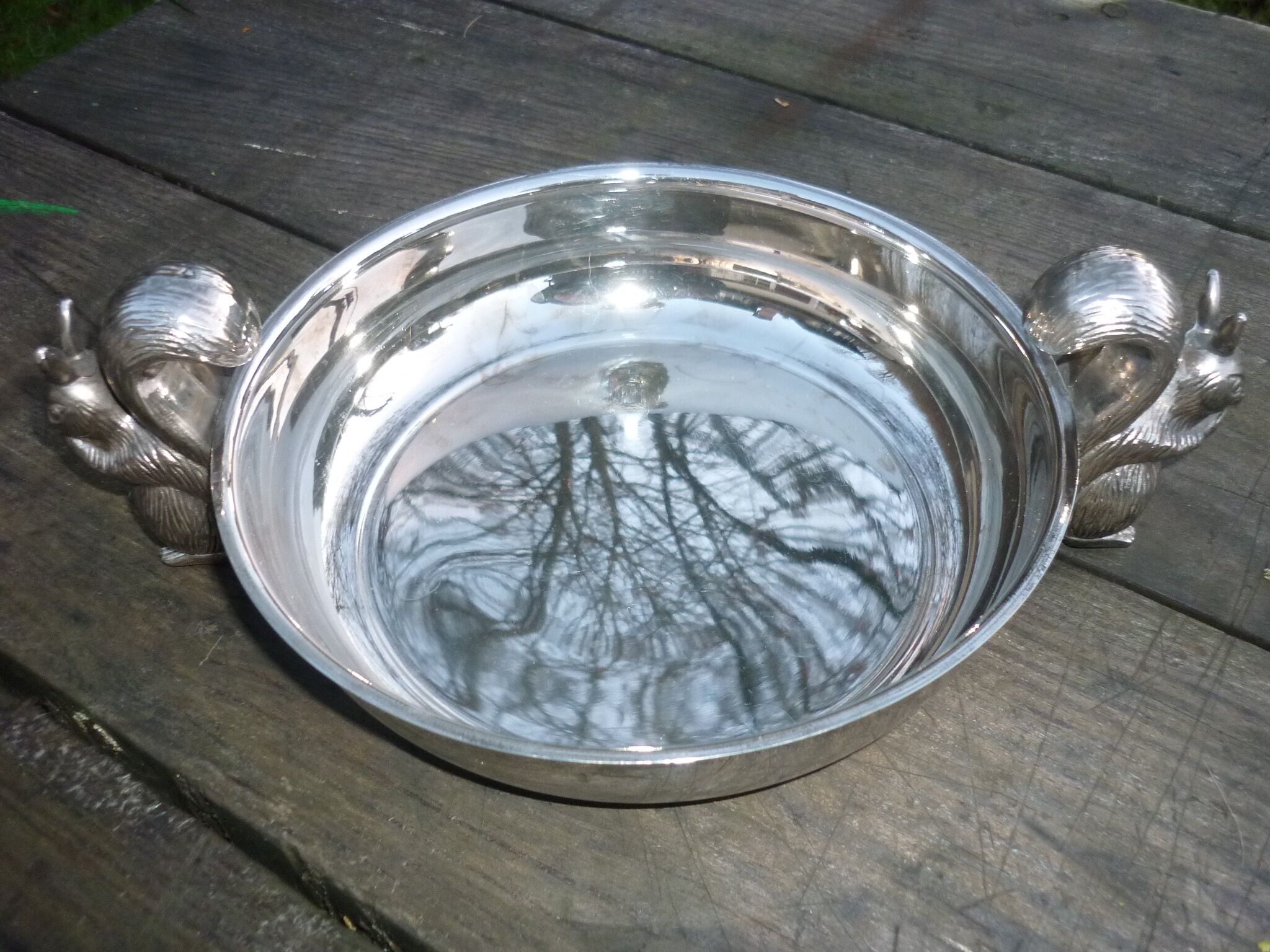 Silver metal dish with squirrels