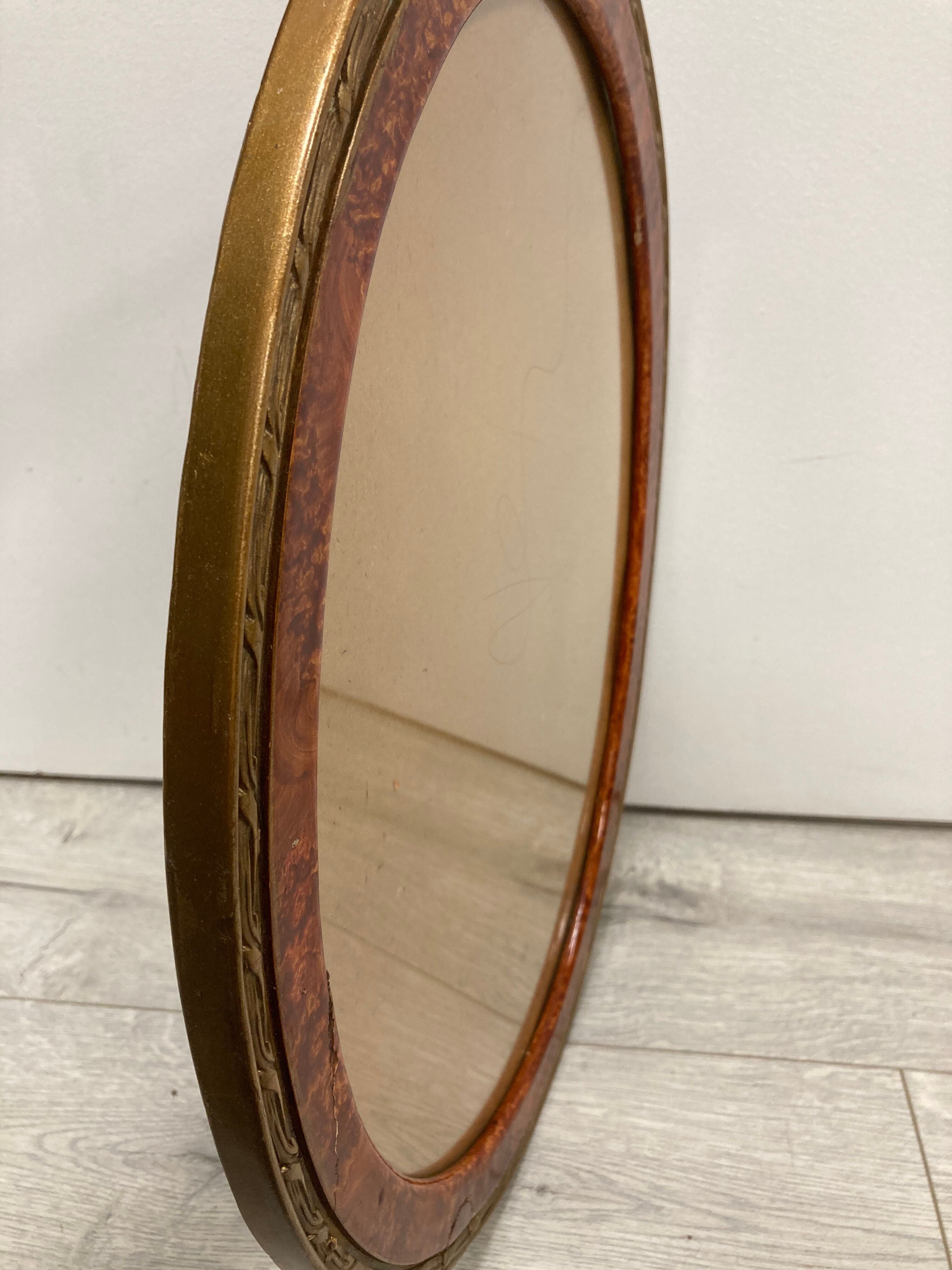 Cadre ovale imitation loupe