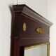 Antique Empire fireplace mirror in mahogany with a bronze frame, Italy, 19th century.