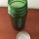 Old green glass jar original aluminum lid to screw