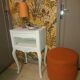 Pouf art deco in suede fabric color orange wooden legs