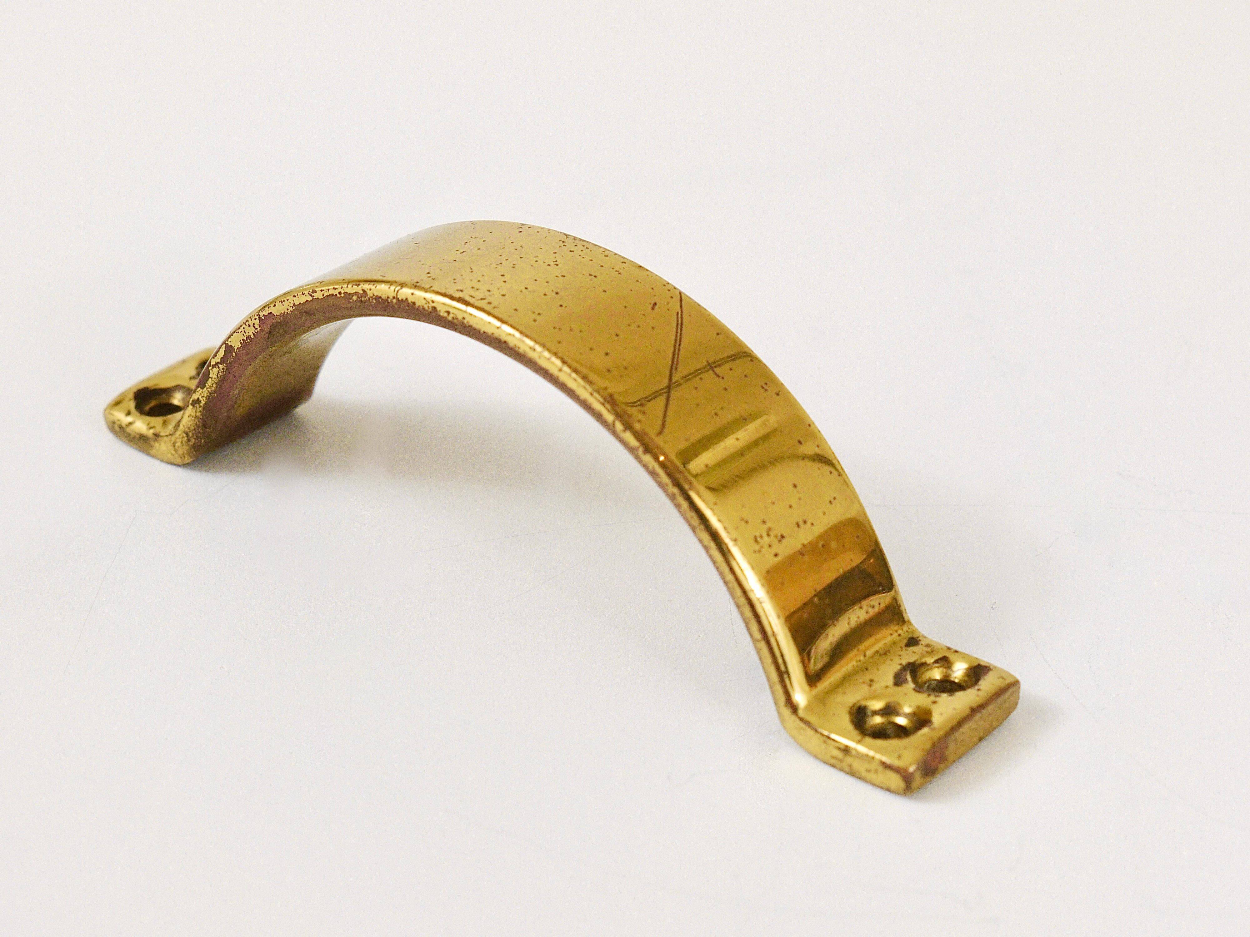 Up to 50 mid-century brass handles for doors, drawers, chests of drawers, Austria, 1950s.