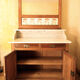 Vintage vanity toilet furniture with marble top.