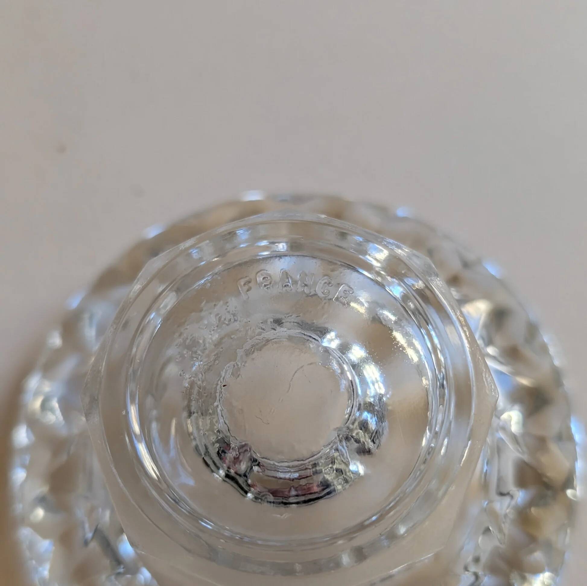 Chiseled glass candle holder