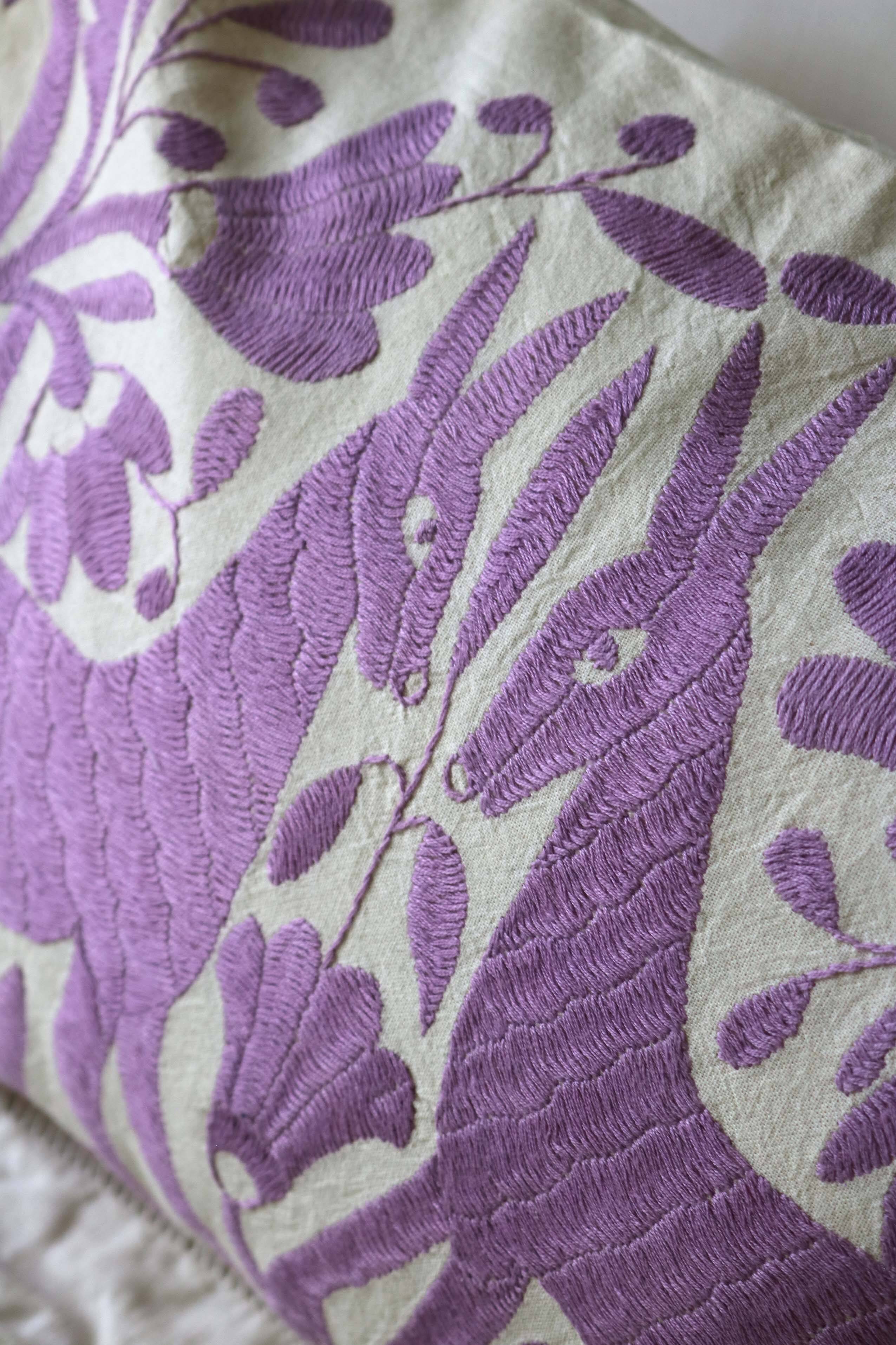 Hand-embroidered cushion