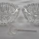Antique crystal salt and pepper shakers, with their small spoon