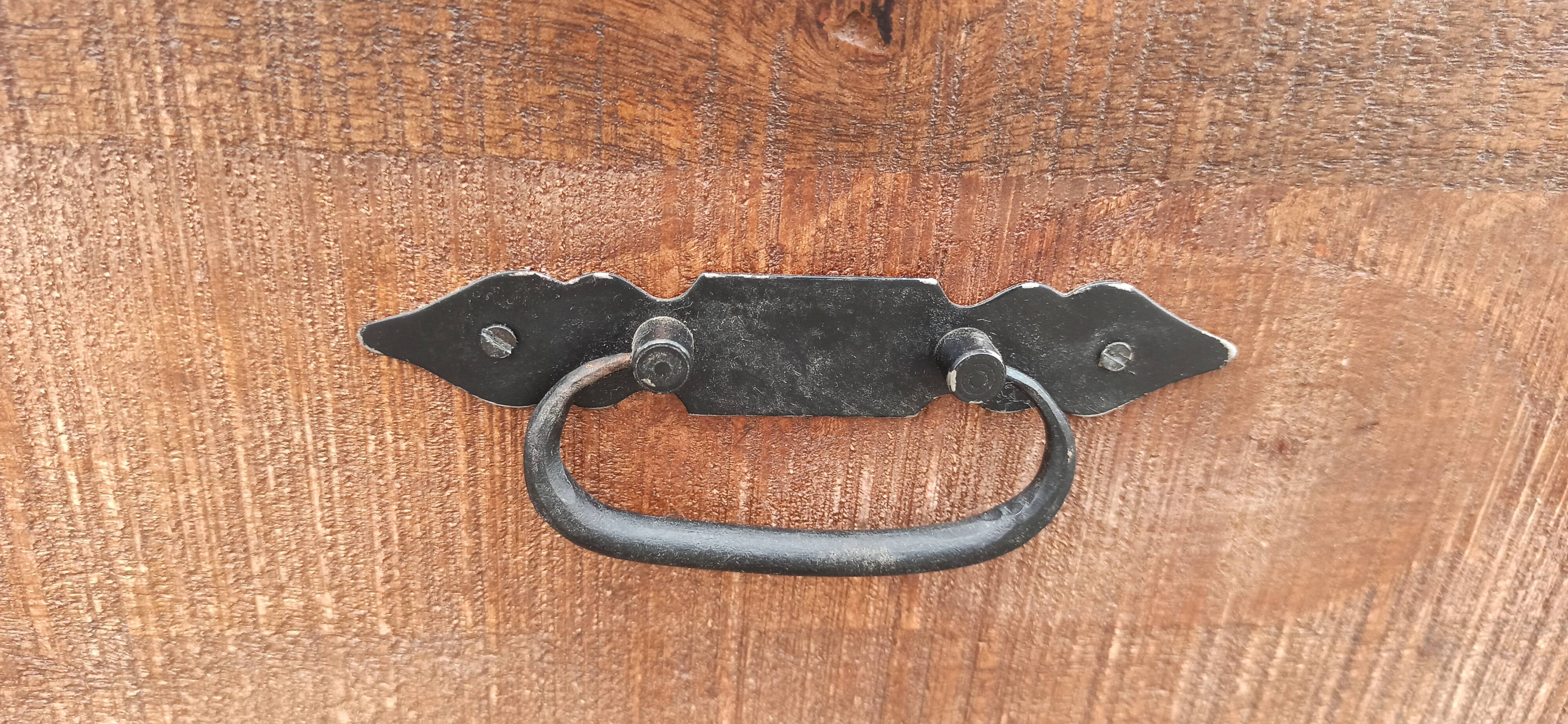 Black metal sideboard with wooden drawers