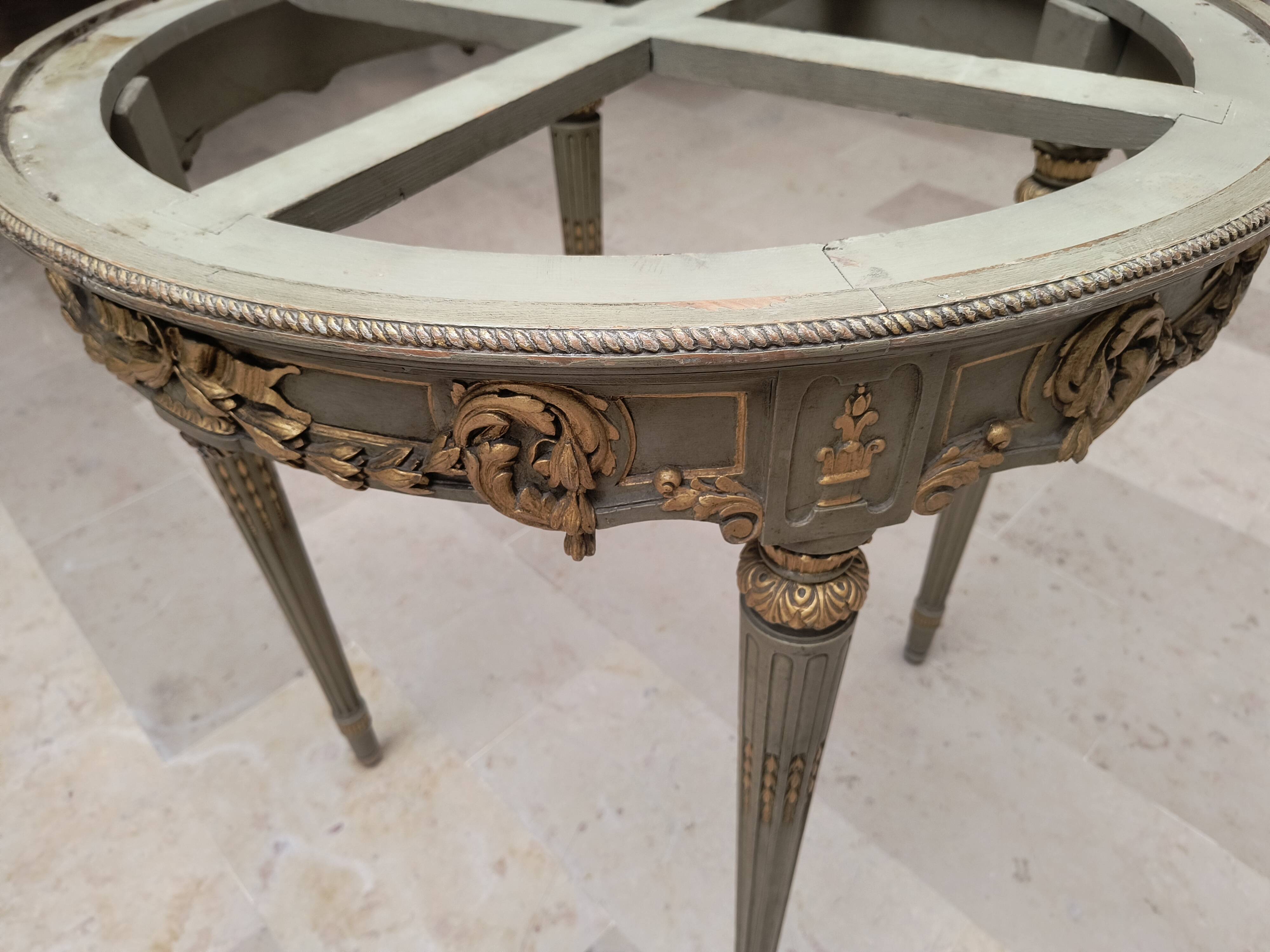 Louis XVI table with carved wood and Carrara marble.