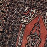 Tapis vintage fait main Bukhara de prière en laine rouge (45cm x 101cm)
