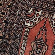 Tapis vintage fait main Bukhara de prière en laine rouge (45cm x 101cm)
