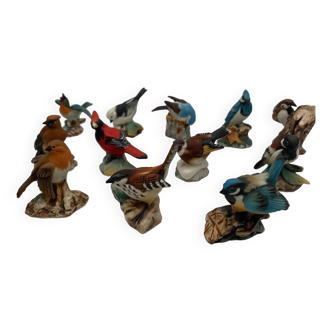 Set of 12 painted porcelain biscuit birds