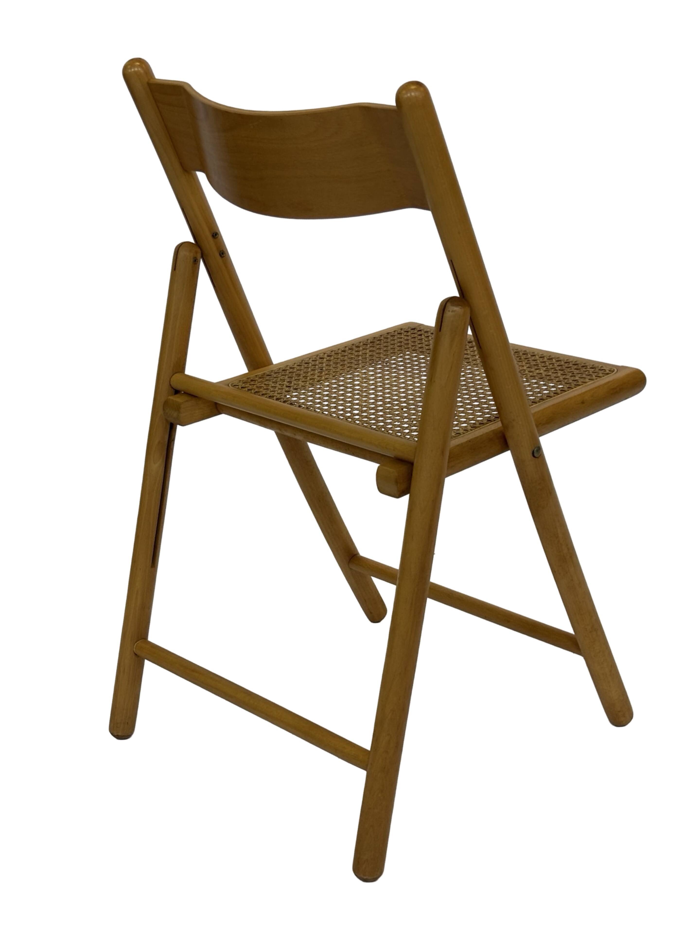 Vintage wooden folding chair with rattan seat 80s minimalist design