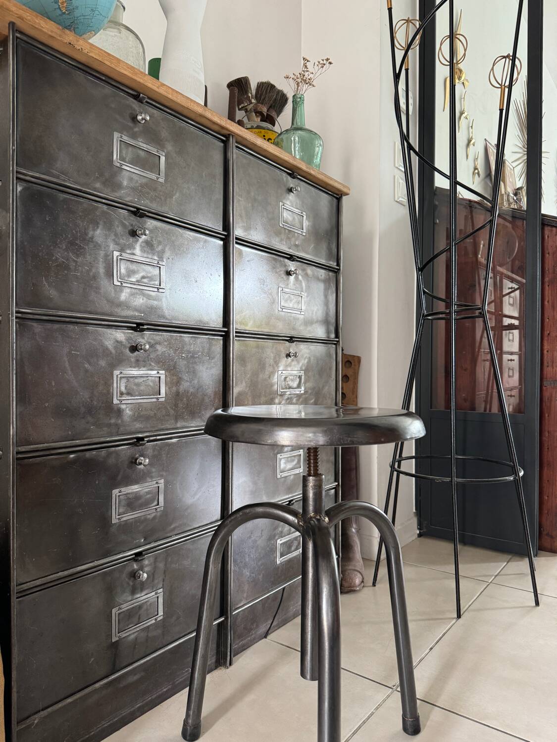 Height-adjustable tripod metal stool