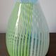 Blown glass vase with opal glass threads