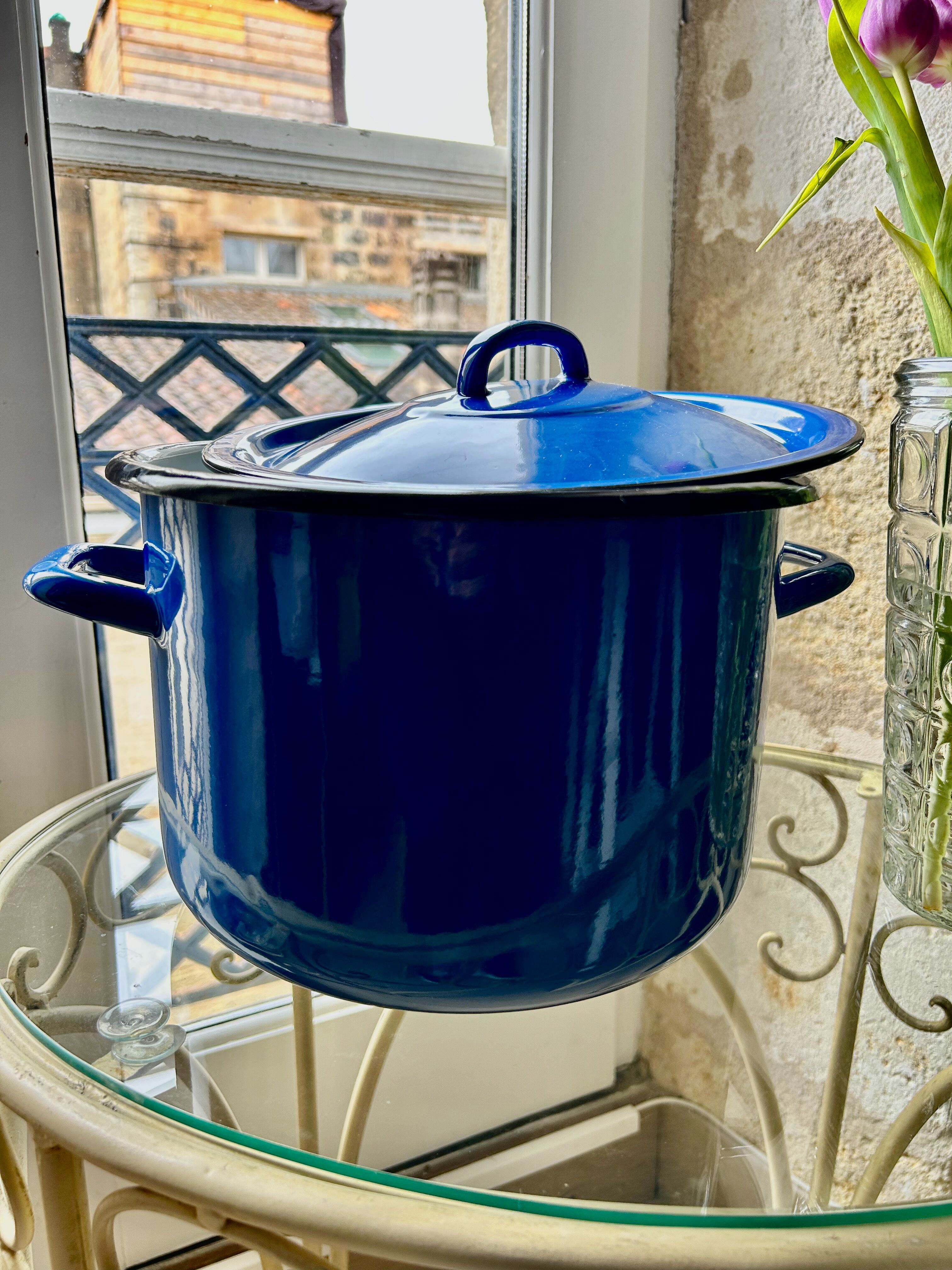 Vintage pot in enamelled sheet metal