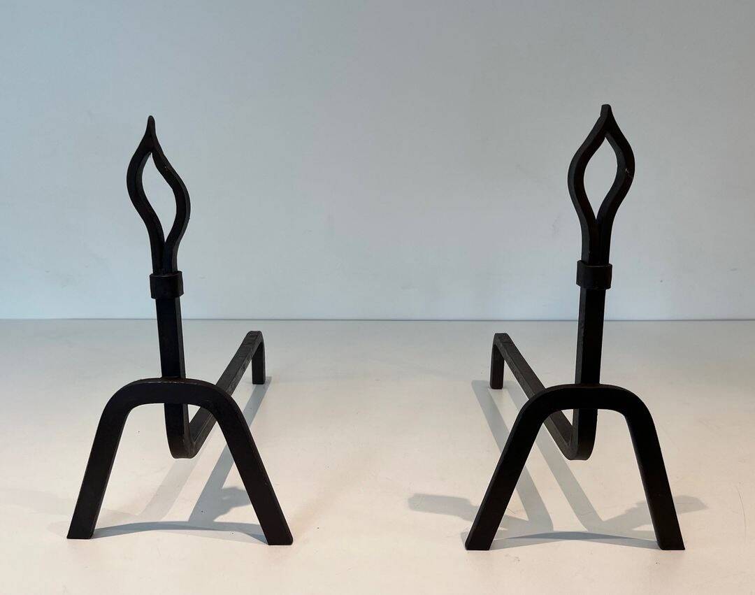 Pair of Modernist Andirons in Wrought Iron with Stylised Torches and Bases Ang