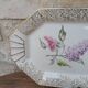 Limoges enamel porcelain cake dish LF with lilac flower decoration.