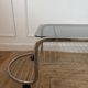 Table basse en métal et verre fumé 1970