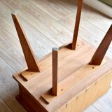Scandinavian bedside table with compass legs