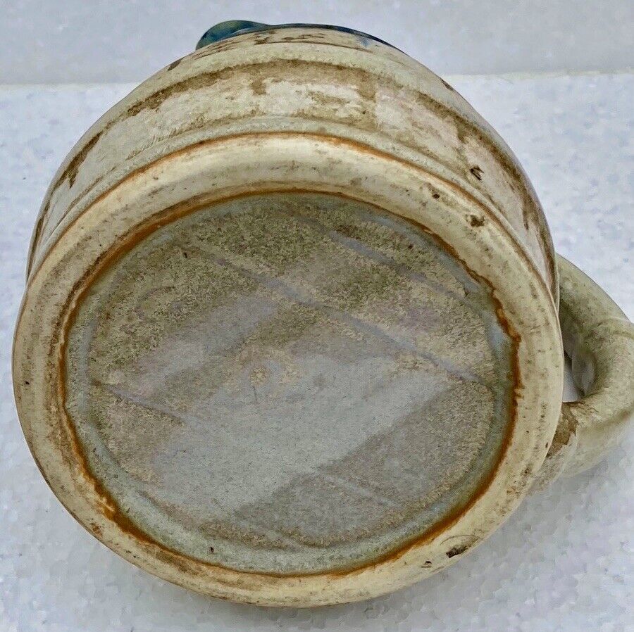 Enamelled ceramic pitcher