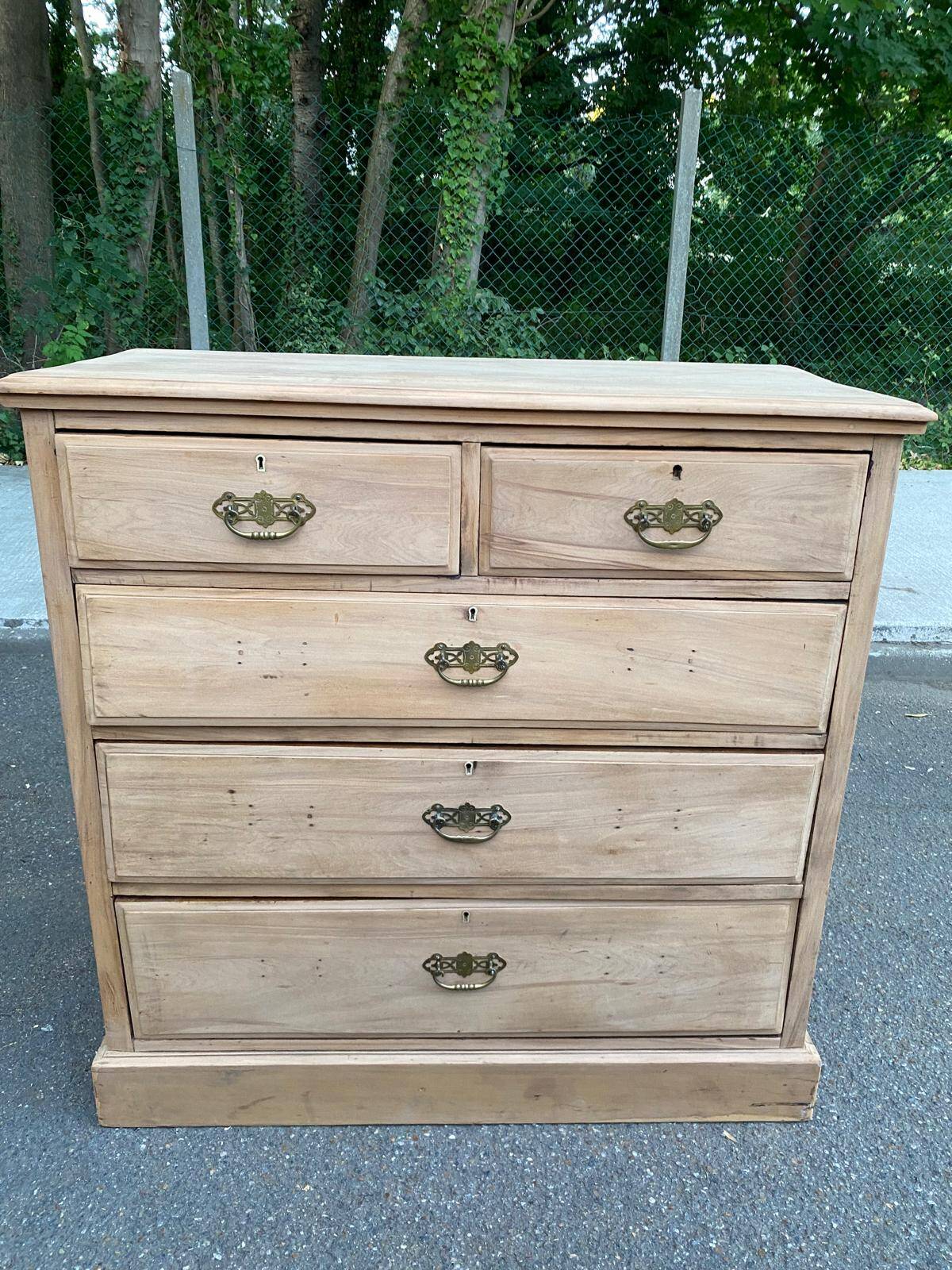 English stripped commode made of solid raw wood from the 19th century.