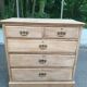 English stripped commode made of solid raw wood from the 19th century.