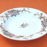Old hollow dish Polychrome earthenware Floral decoration Diameter: 255mm