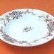 Old hollow dish Polychrome earthenware Floral decoration Diameter: 255mm