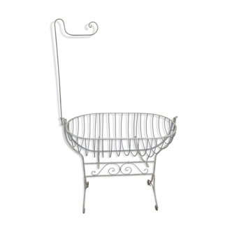 White wrought iron cradle