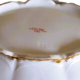 vegetable dish or soup tureen in fine porcelain, decorated with golden ribbons