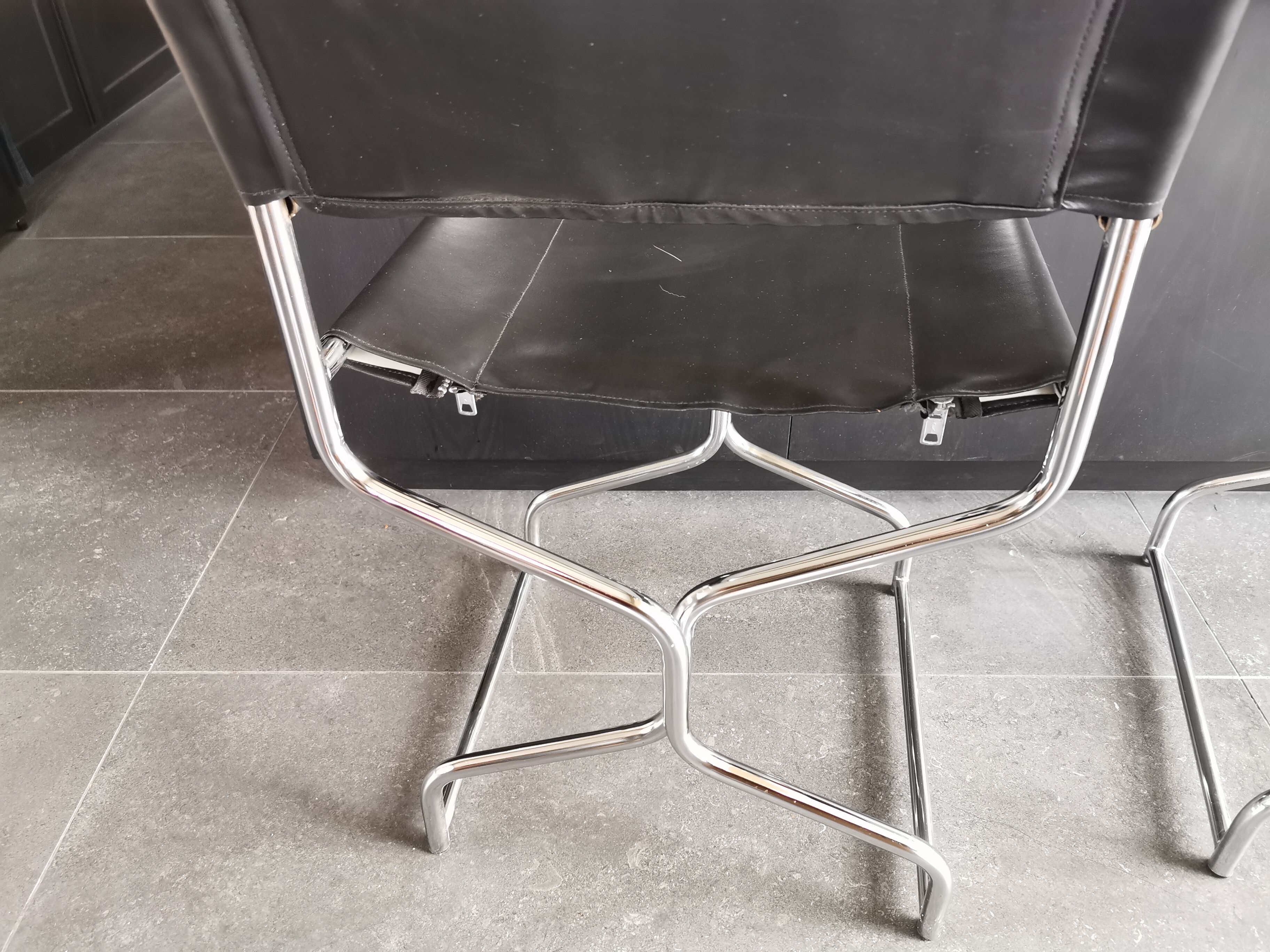 Pair of vintage metal director style armchairs