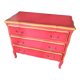 Commode patiné or mat et rouge