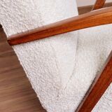 Vintage armchair in pearl bouclé, mid-century modern design from the 1960s.