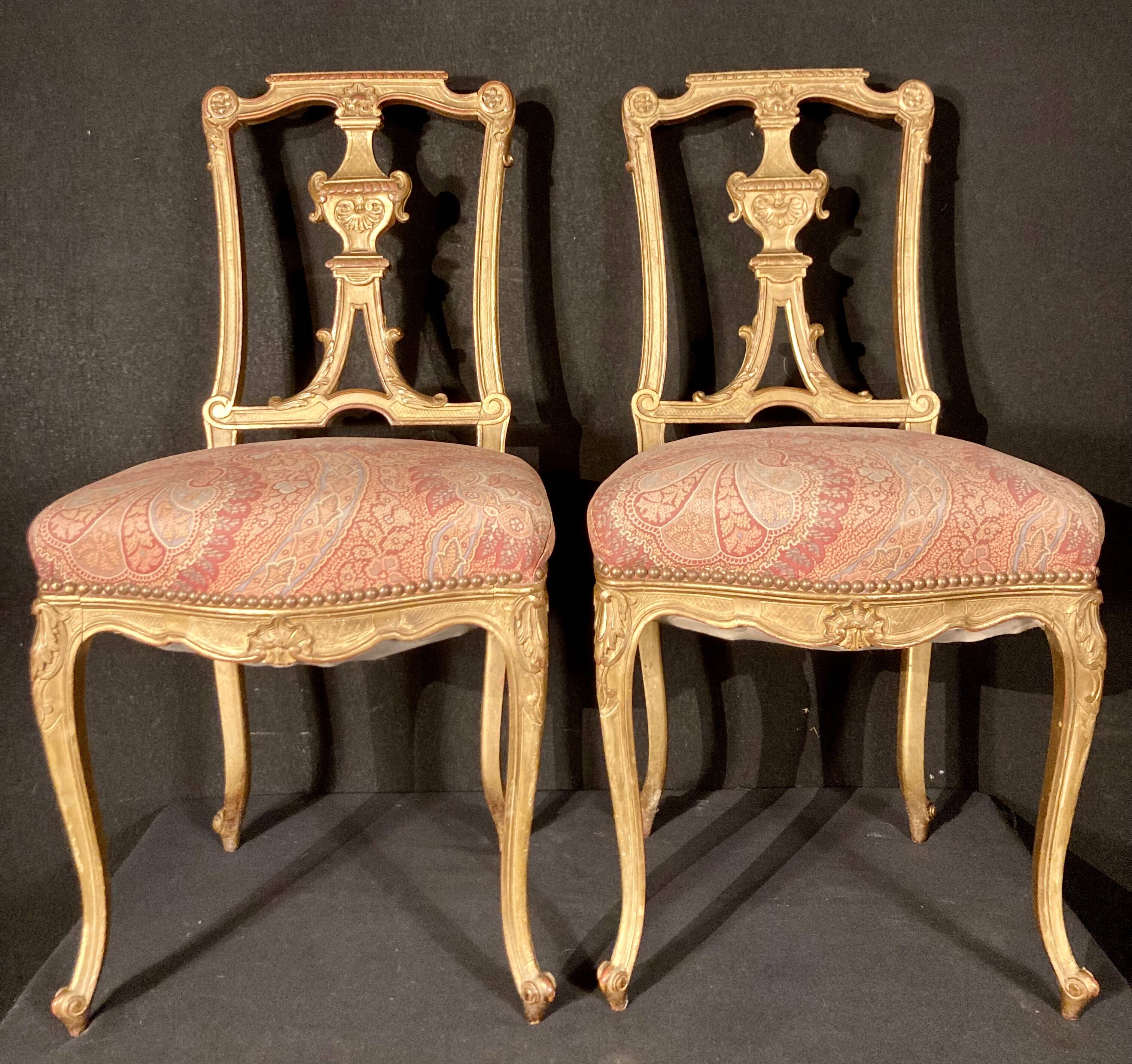 Pair of gilded wooden chairs