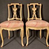 Pair of gilded wooden chairs