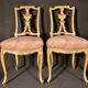 Pair of gilded wooden chairs