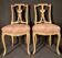 Pair of gilded wooden chairs