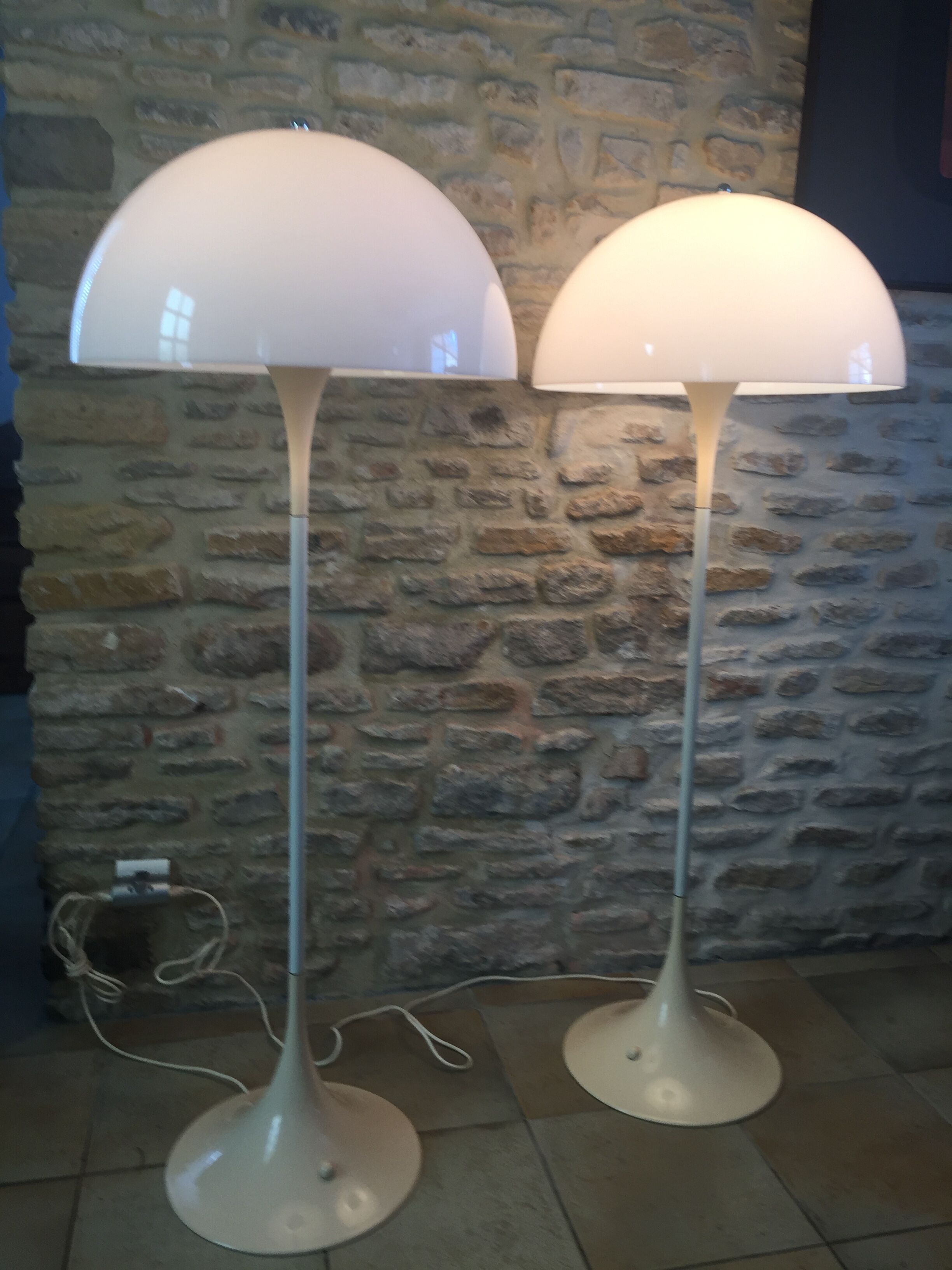 Pair of "Panthella" floor lamps by Verner Panton