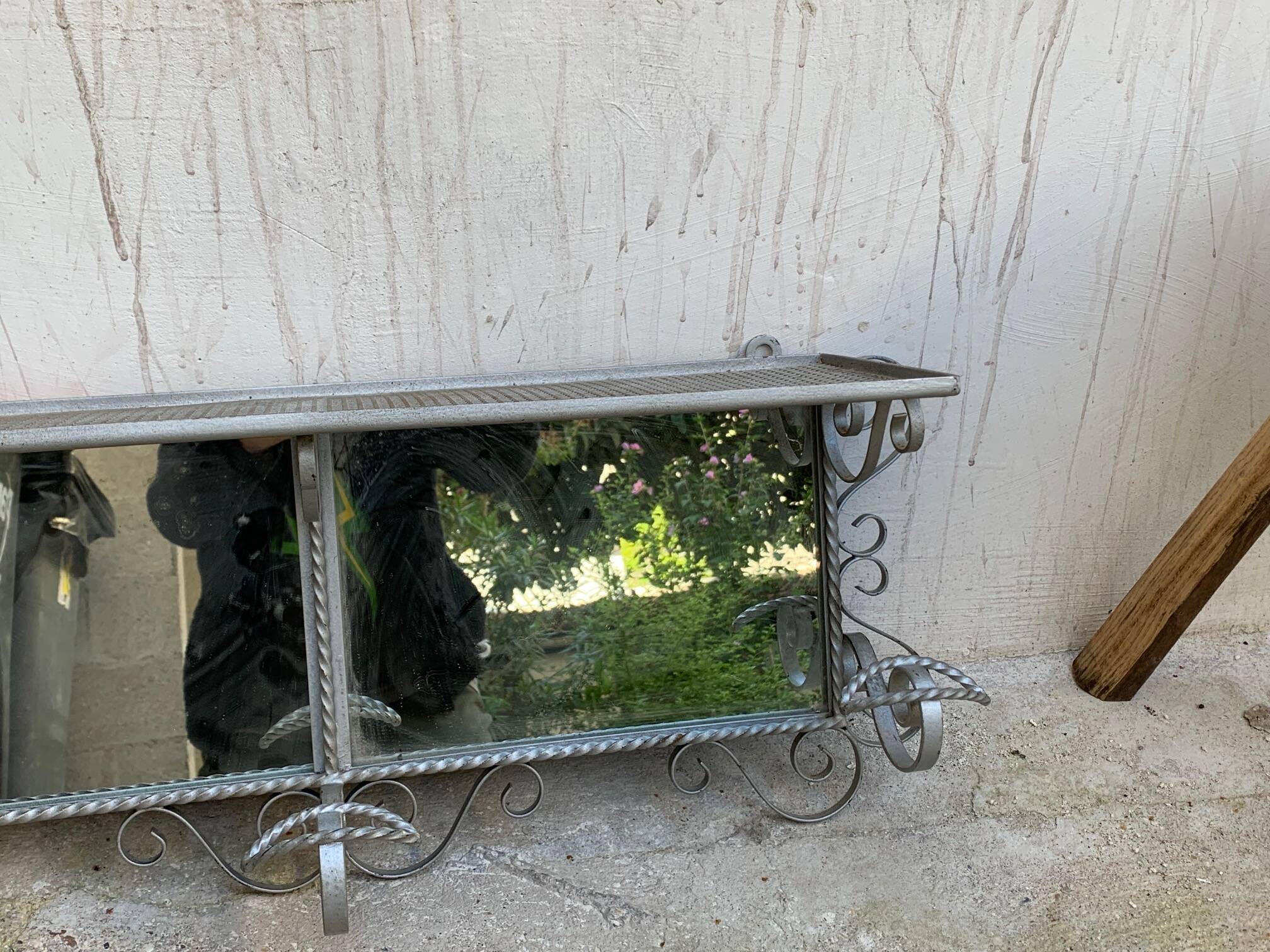 Wall coat rack, wrought iron hook with vintage mirror.
