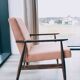 Vintage salmon red armchair modern design by H. Lis