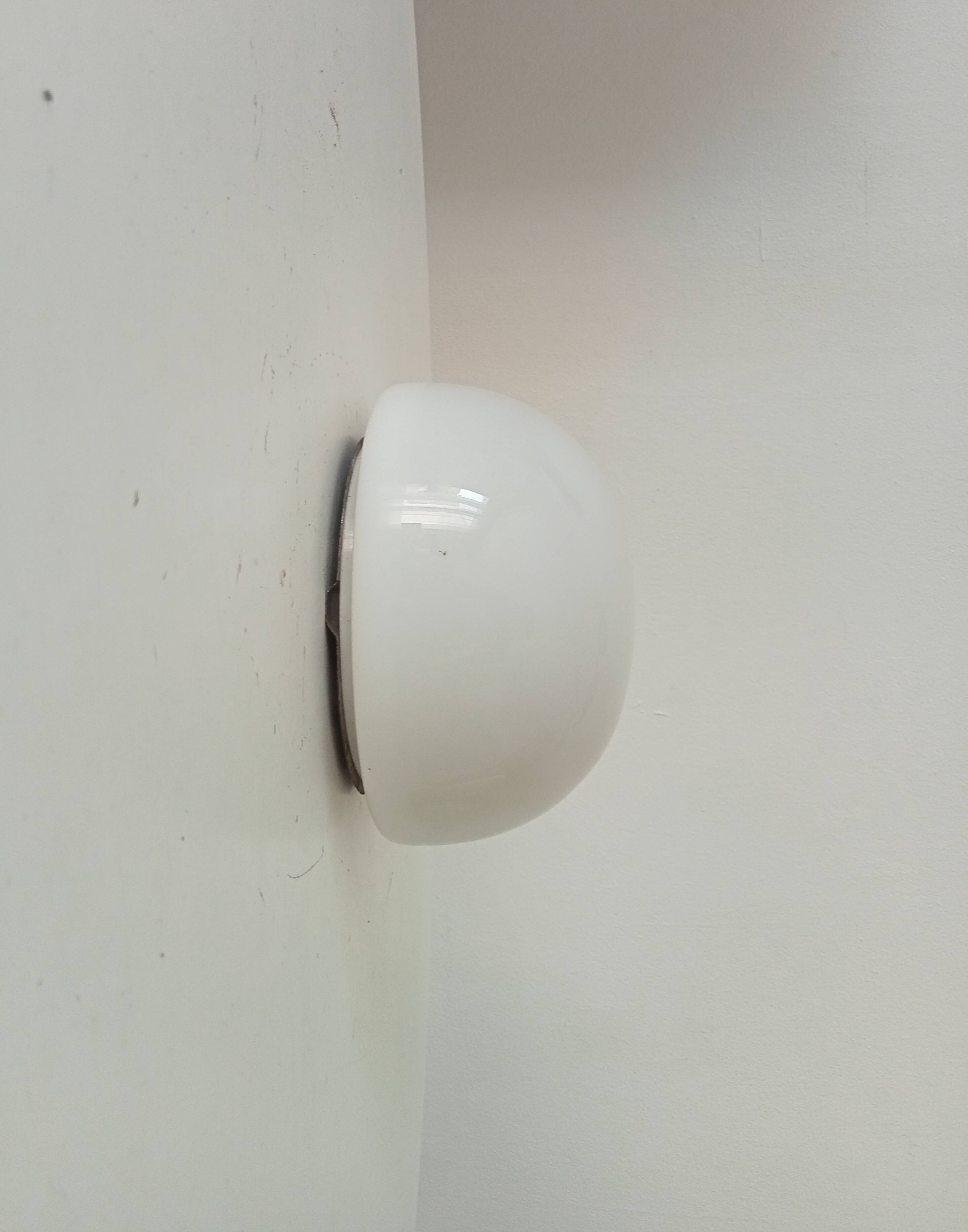 Vintage opaline wall light from the 1960s.