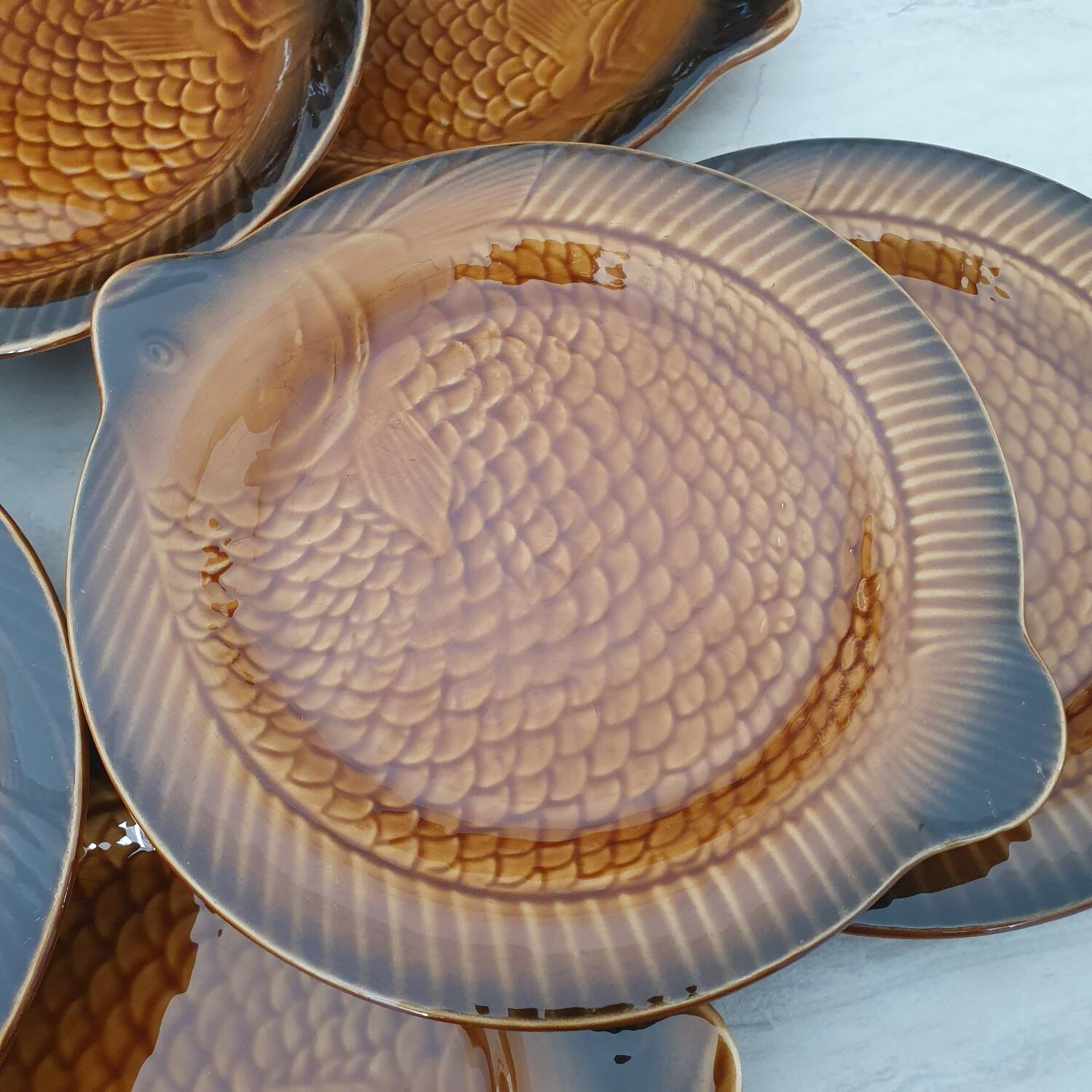 Sarreguemines / 11 earthenware fish-shaped plates