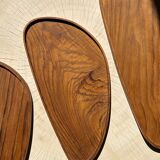 Trio of rounded triangular shaped trays or cups in monoxyl teak
