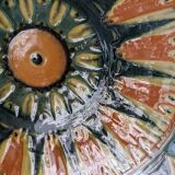 Vintage ceramic plate with enamel decoration
