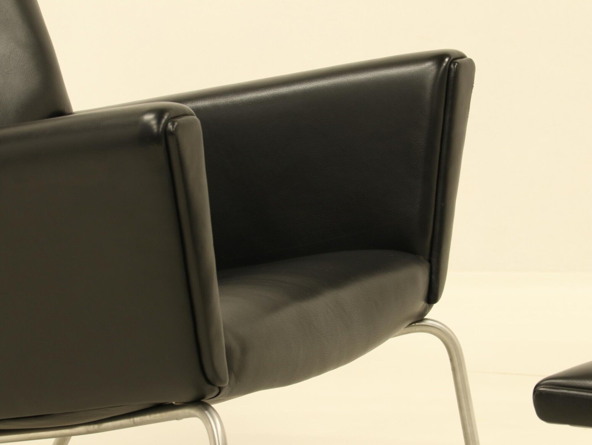 Wing chair & matching ottoman – CH445 & CH446 – by Hans Wegner